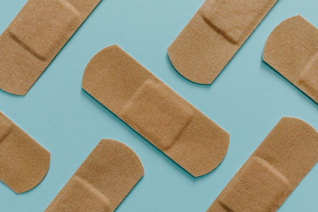 bandaids on blue background