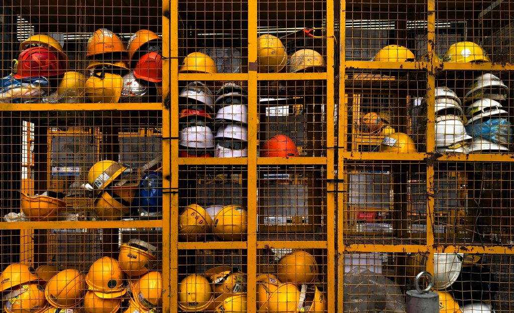 hard hats on storage shelves