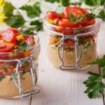 healthy-breakfast-hummus-with-vegetables-glass-jars_266870-2349